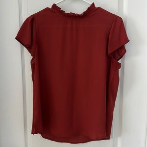 Rust colored blouse